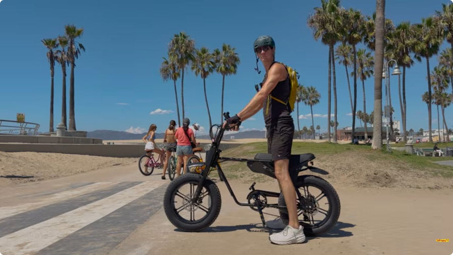 TailHappyTV with the TXED Maverick electric bike at the beach