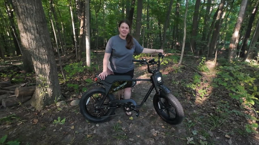 True North Due South creator with the TXED Maverick electric bike in a wooded setting