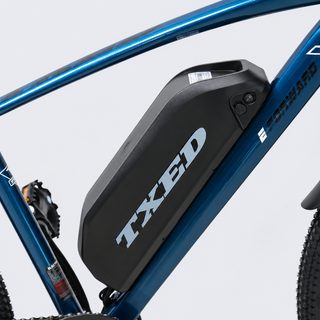 TXED Trail Blue 04 battery on light grey studio background