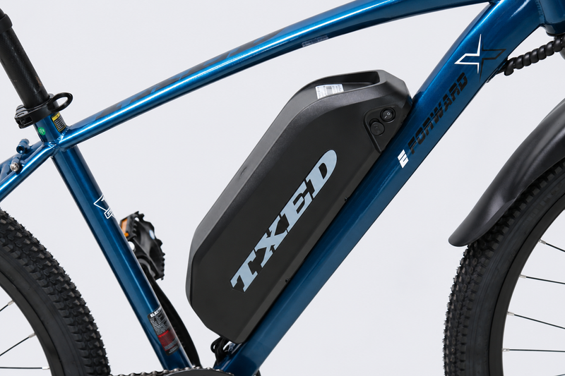 TXED Trail Blue 04 battery on light grey studio background