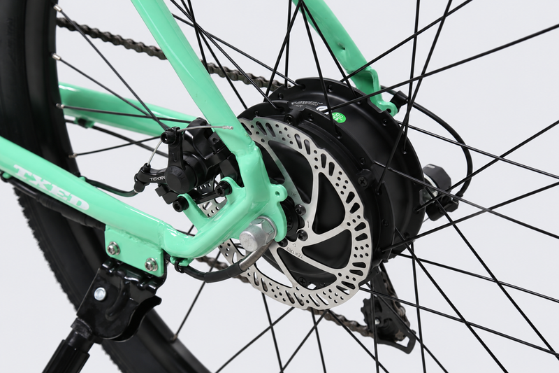 TXED Trail Mint Green 05 drivetrain on light grey studio background