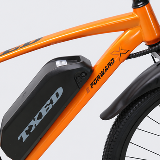 TXED Trail Orange 04 battery on light grey studio background