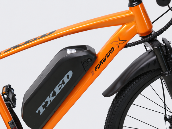 TXED Trail Orange 04 battery on light grey studio background