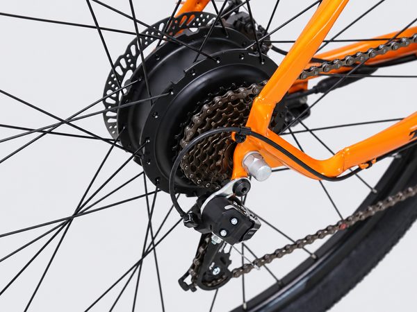 TXED Trail Orange 05 drivetrain on light grey studio background
